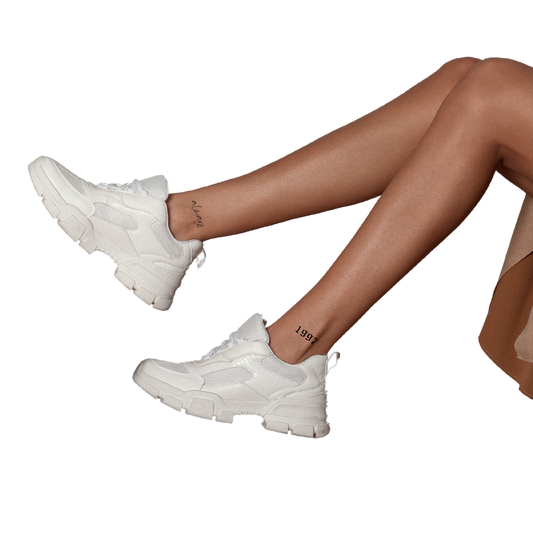 Enkelbandjes tattoo: stijlvol en subtiel aan je enkel