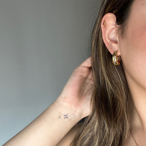 Scintillio del tatuaggio temporaneo