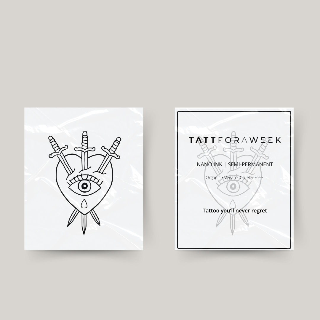 Tatuaggio temporaneo cuore con occhio e spade