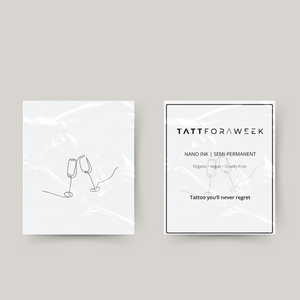 Bicchieri di champagne con tatuaggio temporaneo